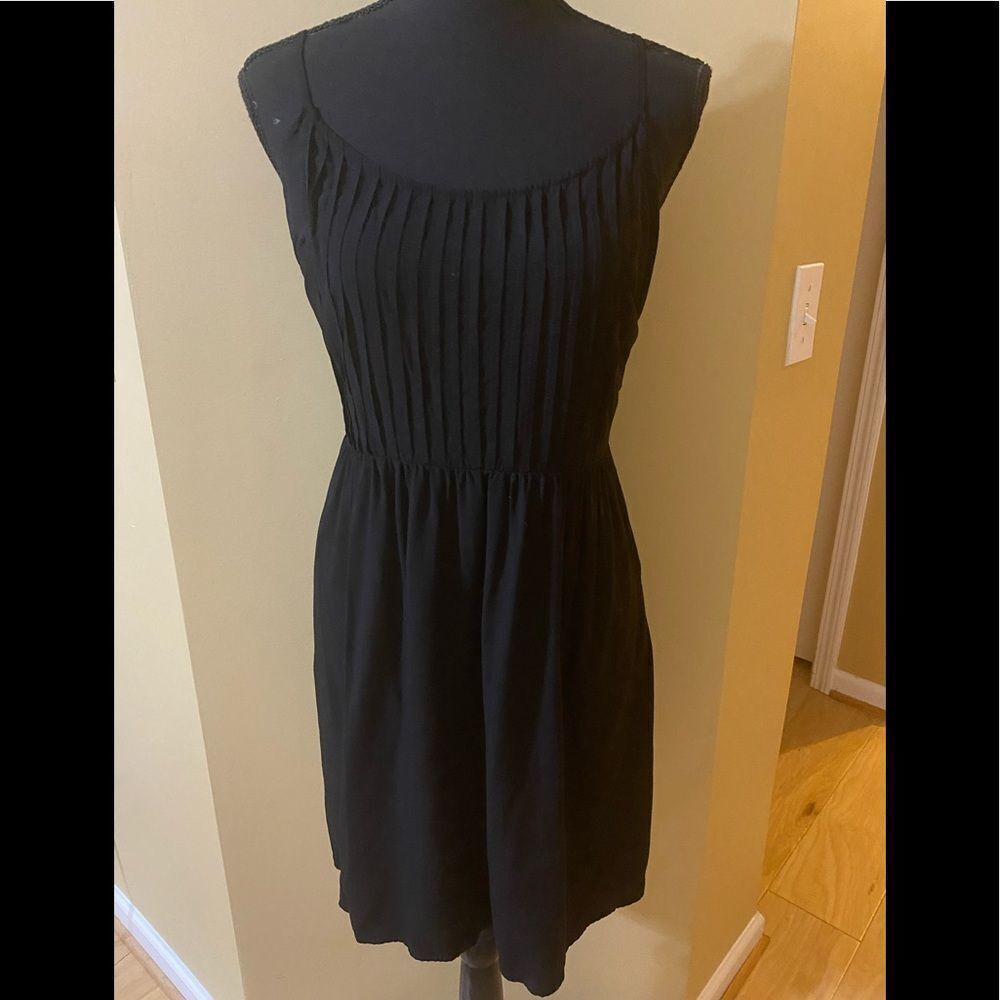 Old Navy size small black mini sundress with side zipper.